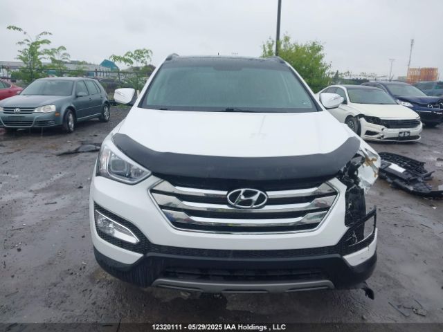 5XYZUDLB9EG154918 Hyundai SANTA FE SPORT