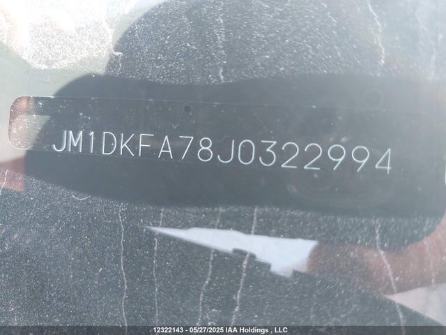 JM1DKFA78J0322994 Mazda pe