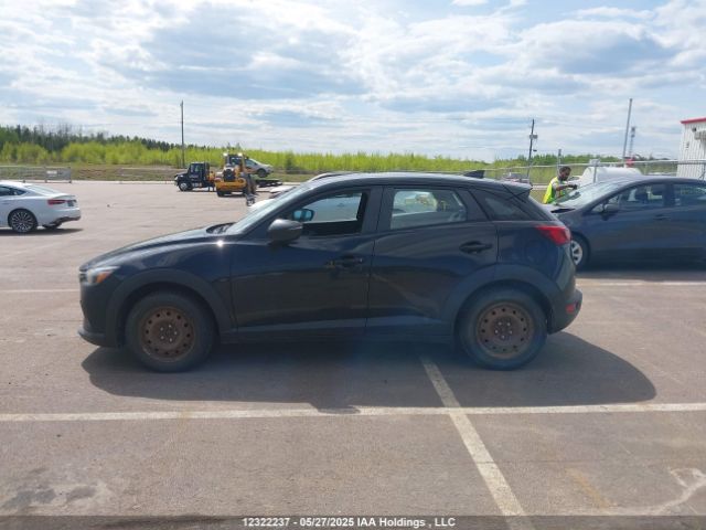 JM1DKFC76J0329469 Mazda Cx-3 Touring