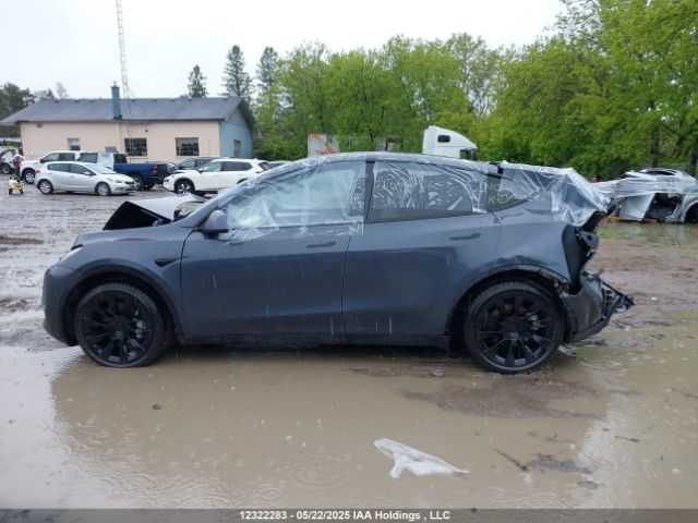 7SAYGDEE2PF605677 Tesla Model Y Long Range