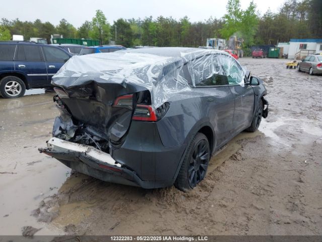 7SAYGDEE2PF605677 Tesla Model Y Long Range