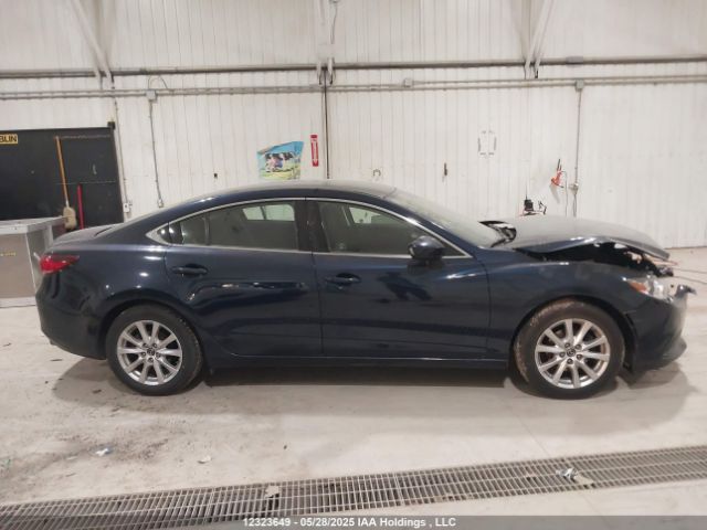 JM1GJ1U54G1438998 Mazda py