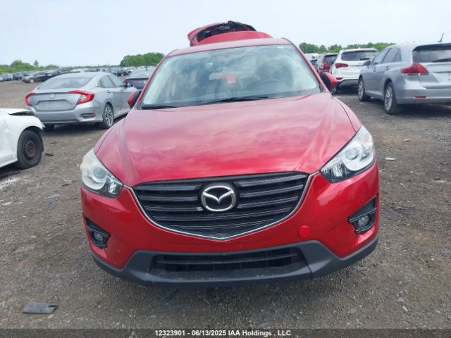 JM3KE2CY7G0678074 Mazda py