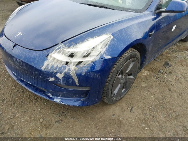 5YJ3E1EA2NF258132 Tesla 2022
