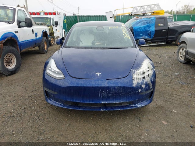 5YJ3E1EA2NF258132 Tesla 2022