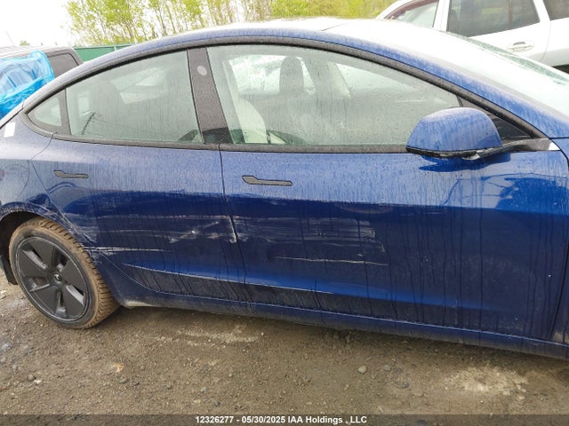 5YJ3E1EA2NF258132 Tesla 2022