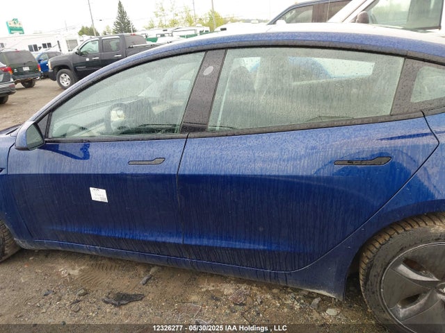5YJ3E1EA2NF258132 Tesla 2022