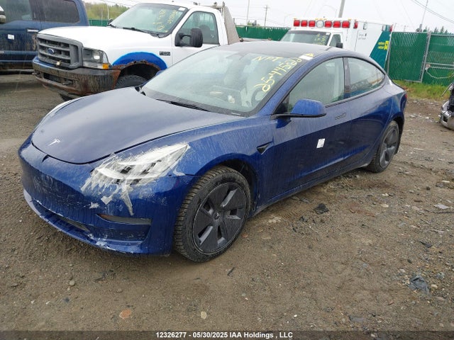5YJ3E1EA2NF258132 Tesla 2022