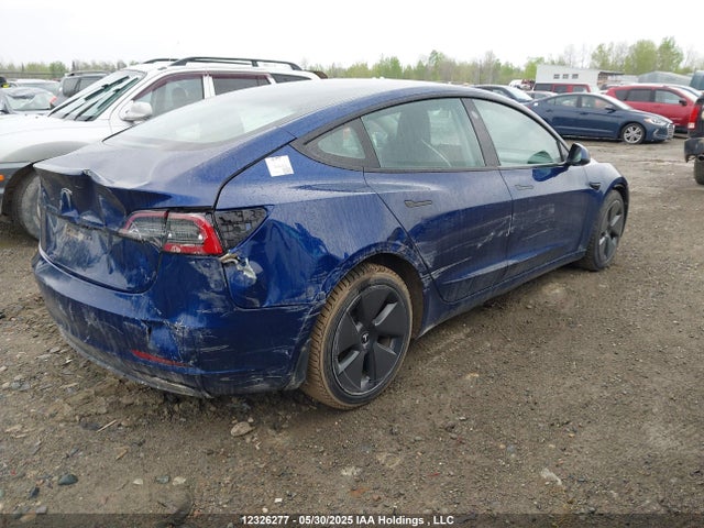 5YJ3E1EA2NF258132 Tesla 2022