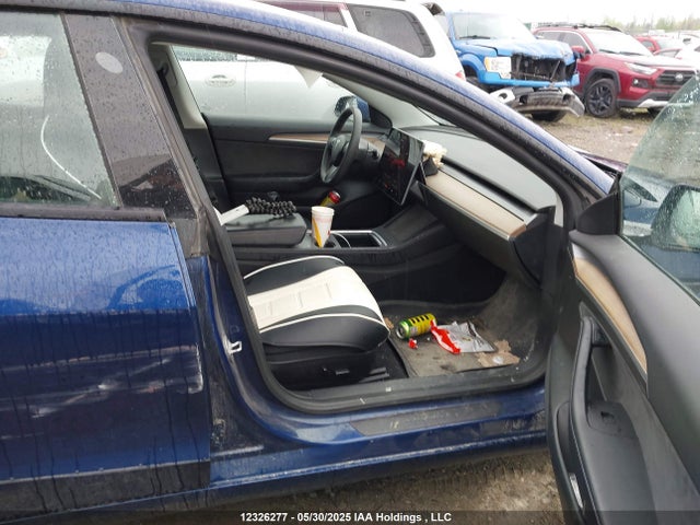 5YJ3E1EA2NF258132 Tesla 2022