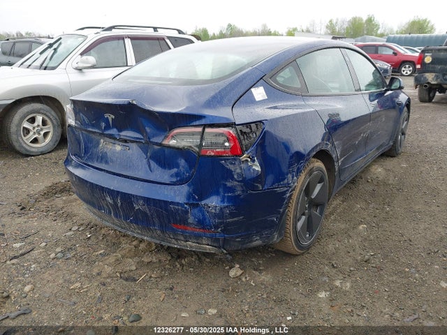 5YJ3E1EA2NF258132 Tesla 2022