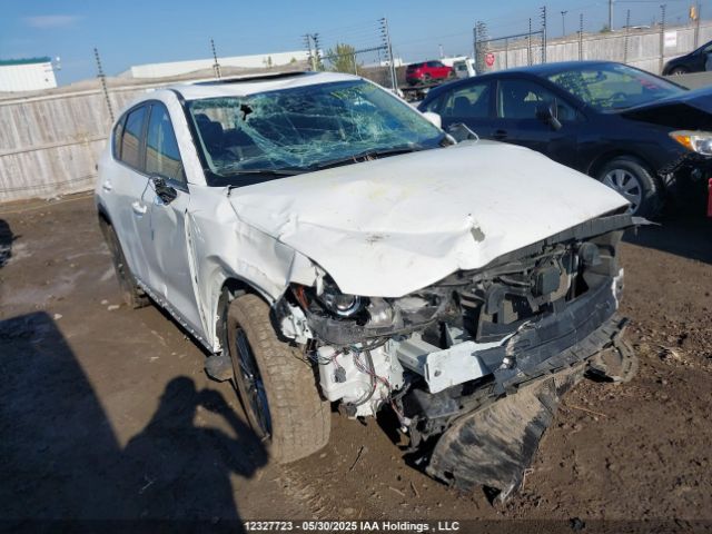 2021 Mazda Cx-5 Touring მანქანა იყიდება აუქციონზე, vin: JM3KFBCM8M0100975, აუქციონის ნომერი: 12327723