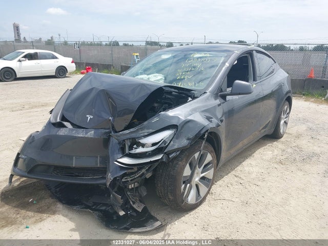 Tesla Model Y 2024 7SAYGDEEXRF018016 Image 2