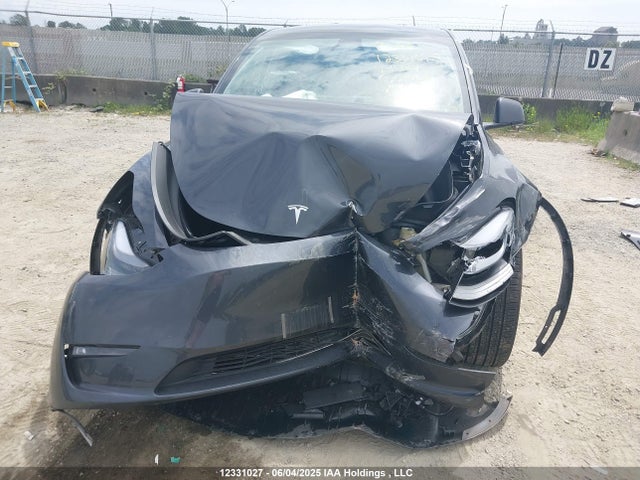 Tesla Model Y 2024 7SAYGDEEXRF018016 Image 6