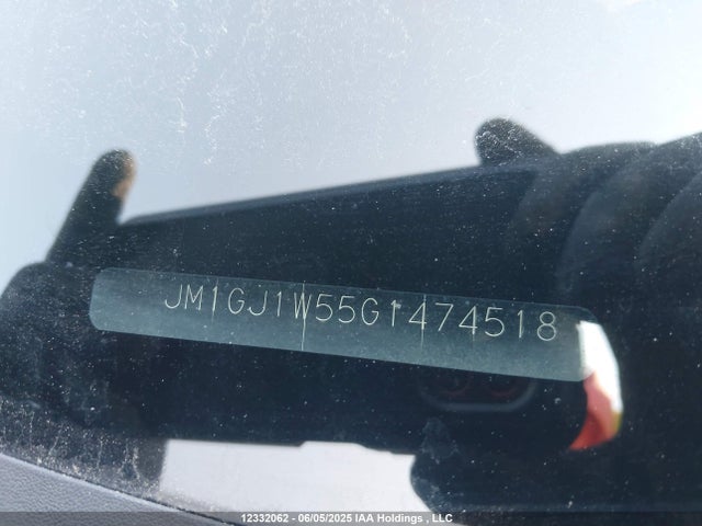 JM1GJ1W55G1474518 Mazda py