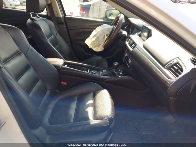 JM1GJ1W55G1474518 Mazda py