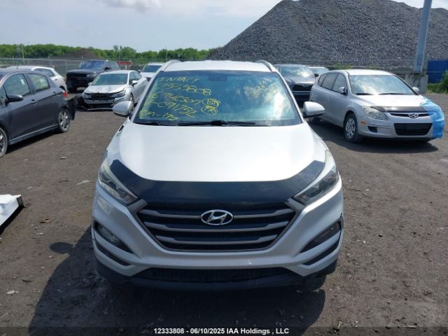 KM8J33A49GU091752 Hyundai Tucson