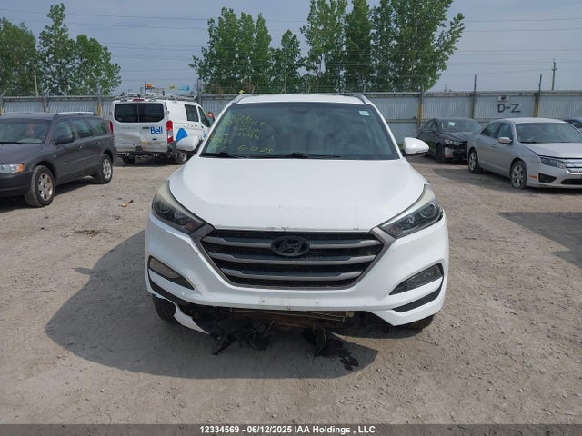 KM8J3CA4XGU154986 Hyundai Tucson