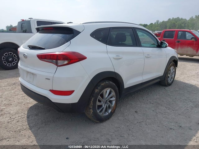 KM8J3CA4XGU154986 Hyundai Tucson