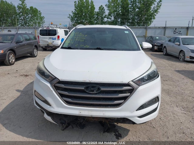 KM8J3CA4XGU154986 Hyundai Tucson