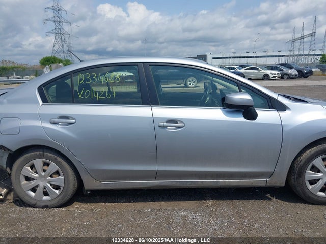 JF1GJAA63FH014267 Subaru 2.0l na