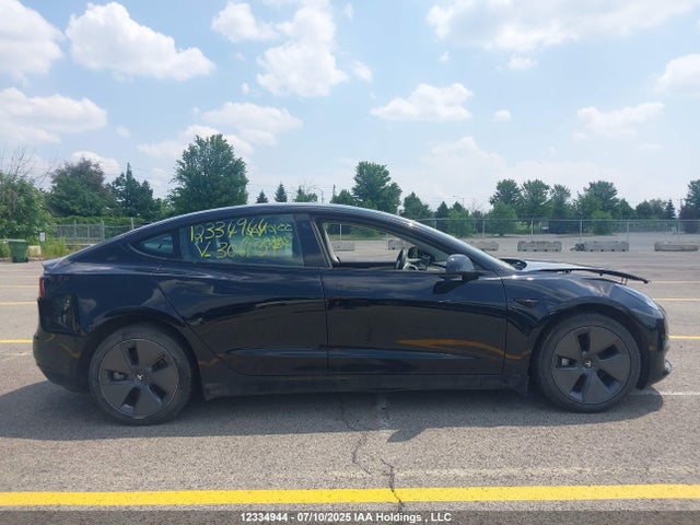5YJ3E1EA3NF306057 Tesla MODEL 3