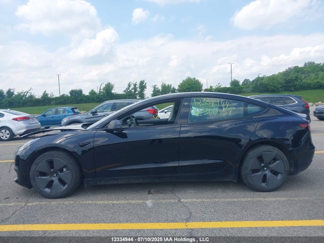 5YJ3E1EA3NF306057 Tesla MODEL 3