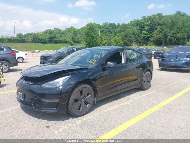 5YJ3E1EA3NF306057 Tesla MODEL 3
