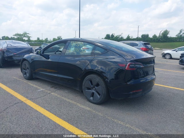 5YJ3E1EA3NF306057 Tesla MODEL 3