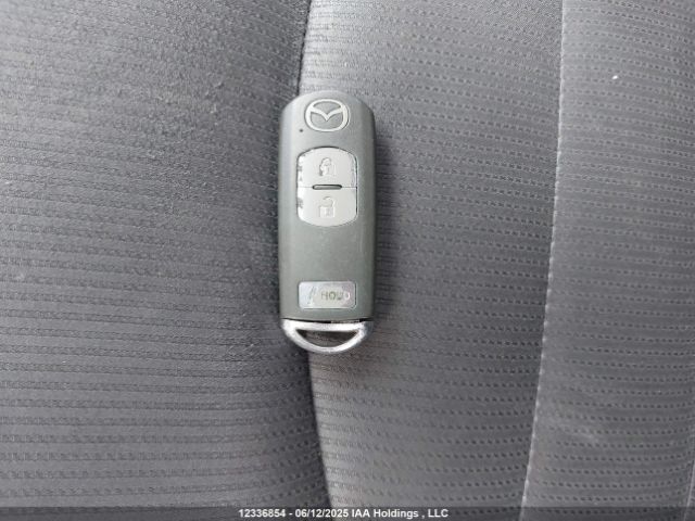 JM1DKBC72G0119033 Mazda pe
