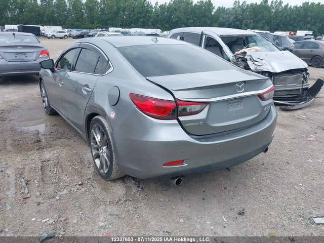 JM1GJ1W62E1115889 Mazda py