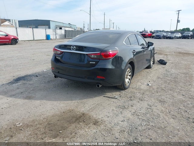 JM1GJ1U52F1218984 Mazda 2015