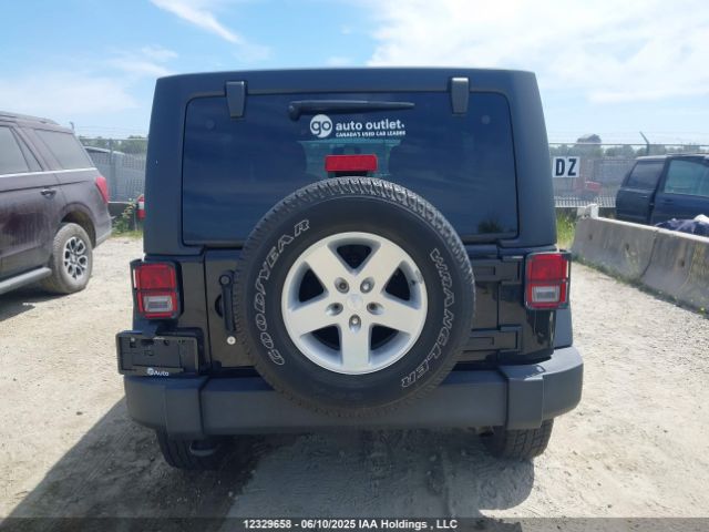 1C4BJWDG2FL698988 Jeep Wrangler Unlimited Sport