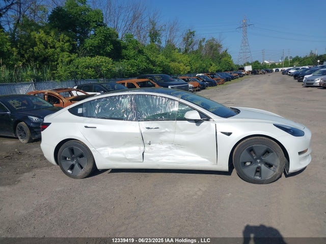 5YJ3E1EA3MF920735 Tesla 2021