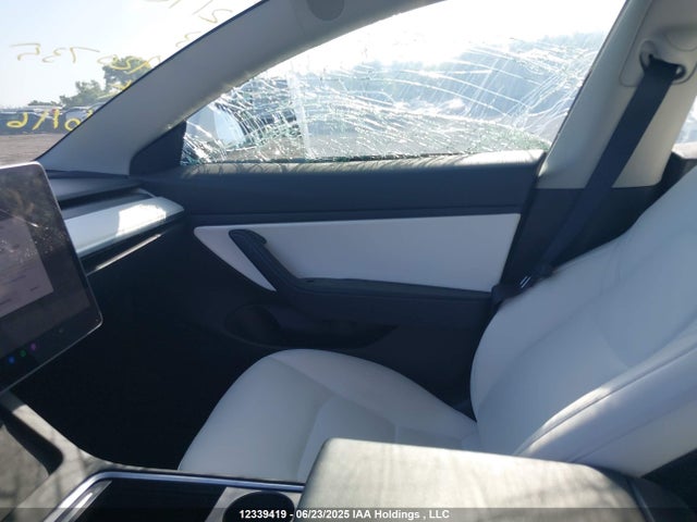 5YJ3E1EA3MF920735 Tesla 2021