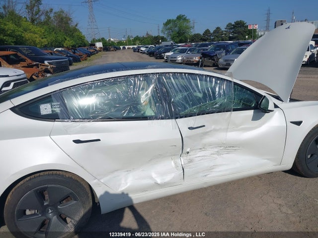 5YJ3E1EA3MF920735 Tesla 2021
