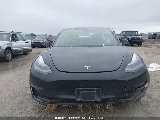5YJ3E1EA9MF976193 Tesla 2021