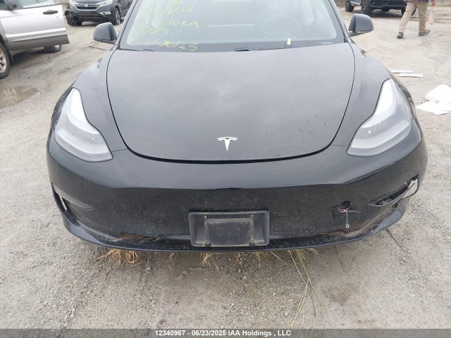 5YJ3E1EA9MF976193 Tesla 2021