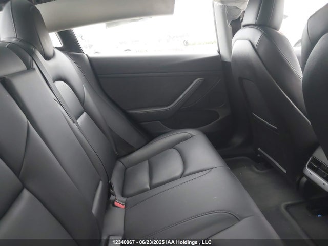 5YJ3E1EA9MF976193 Tesla 2021