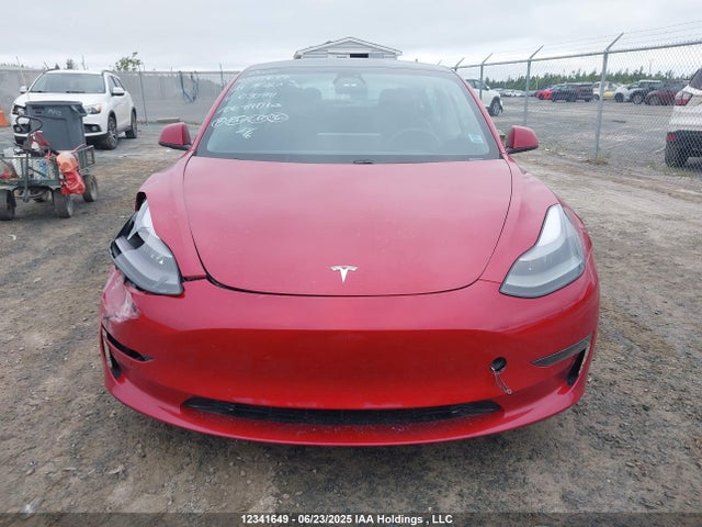 5YJ3E1EA4MF030891 Tesla 2021
