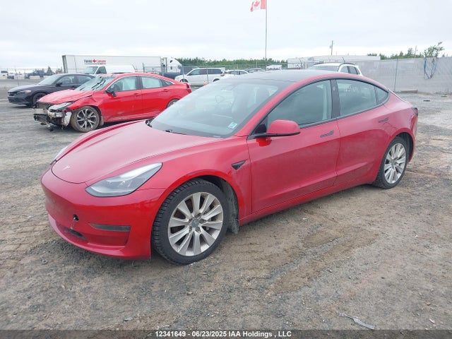 5YJ3E1EA4MF030891 Tesla 2021