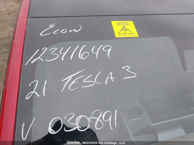 5YJ3E1EA4MF030891 Tesla 2021