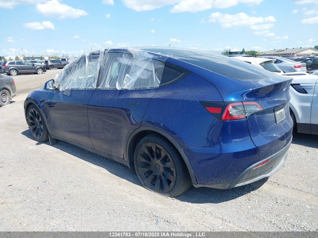 Tesla Model Y 2024 7SAYGDEE7RF065469 Image 3