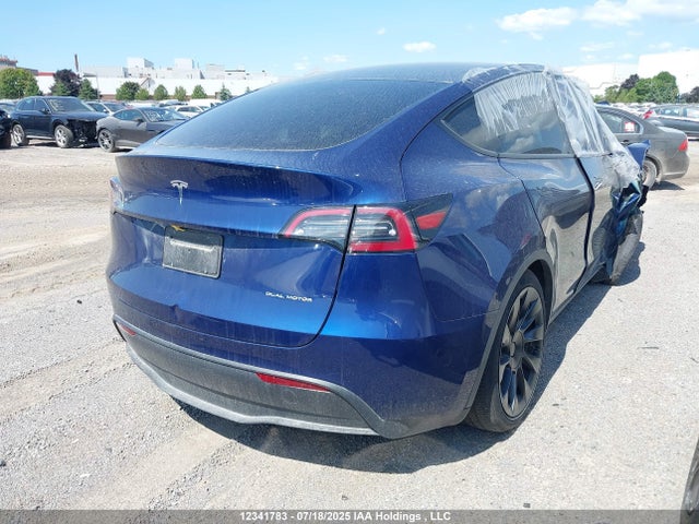 Tesla Model Y 2024 7SAYGDEE7RF065469 Image 4
