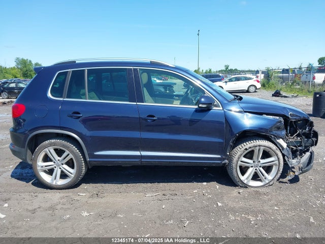 WVGJV3AX0EW615022 Volkswagen Tiguan