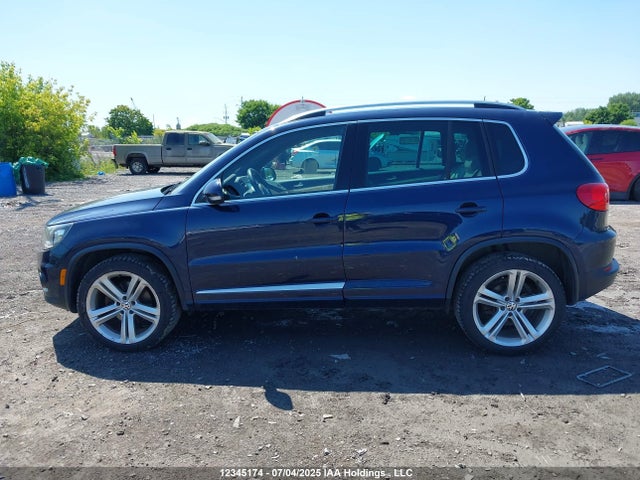 WVGJV3AX0EW615022 Volkswagen Tiguan