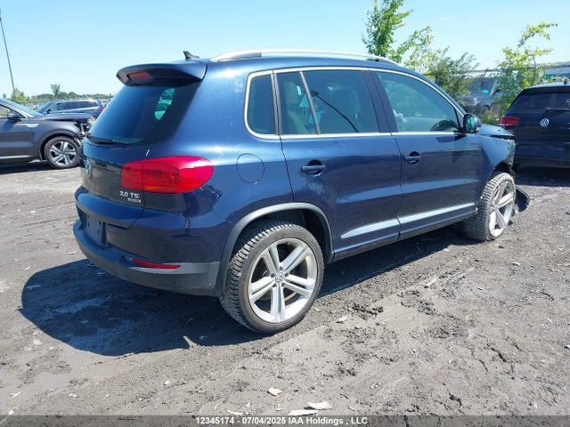WVGJV3AX0EW615022 Volkswagen Tiguan