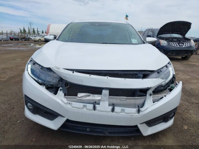 2HGFC1F99HH104301 Honda l15b7
