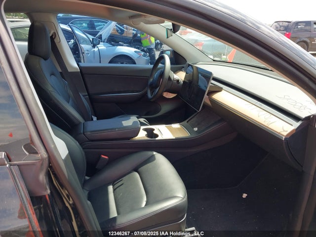 7SAYGDEE9NF385015 Tesla 2022