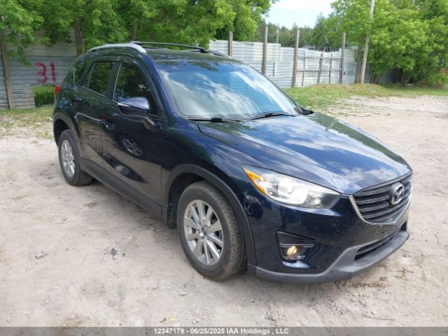 2016 Mazda Cx-5 Touring მანქანა იყიდება აუქციონზე, vin: JM3KE2CY0G0797987, აუქციონის ნომერი: 12347179